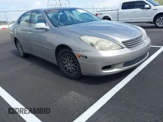 2004 Lexus ES 330 with VIN JTHBA30GX45053526, listed as a IAAI auction lot 41972096 with 264,207 mi miles. Bid and sale history available at carsss.com. Image 1.