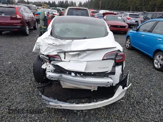 2023 Tesla Model 3 Performance z VIN 5YJ3E1EC9PF545648, wystawiony jako IAAI lot #41573583 z przebiegiem 15 207 mil mil oraz . Historia ofert i sprzedaży dostępna na DreamBid. Obrazek 16.