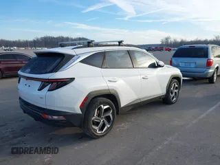2022 Hyundai Tucson SEL with VIN 5NMJCCAE7NH158933, listed as a IAAI auction lot 41531628 with 57,996 mi miles and . Bid and sale history available at DreamBid. Image 4.