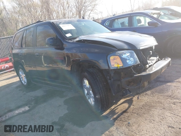 2006 GMC Envoy Denali with VIN 1GKET63M962355586, listed as a IAAI auction lot 41881023 with 235,506 mi miles. Bid and sale history available at carsss.com. Image 1.
