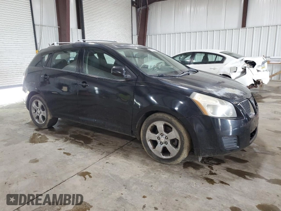 2009 Pontiac Vibe z VIN 5Y2SM67099Z410763, wystawiony jako Copart lot #57608015 z przebiegiem 172 308 mil mil oraz Tytuł czysty. Historia ofert i sprzedaży dostępna na DreamBid. Obrazek 4.