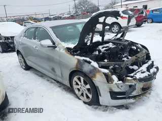 2016 Cadillac ATS Sedan Luxury Collection AWD with VIN 1G6AH5RX0G0196366, listed as a IAAI auction lot 41480506 with 72,196 mi miles. Bid and sale history available at carsss.com. Image 1.