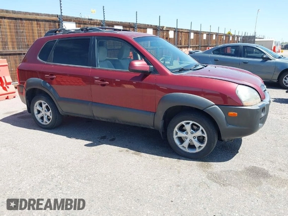 2009 Hyundai Tucson Limited with VIN KM8JN72D79U933958, listed as a IAAI auction lot 42006262 with 143,502 mi miles. Bid and sale history available at carsss.com. Image 1.