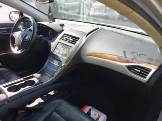 2015 Lincoln MKZ with VIN 3LN6L2G9XFR607285, listed as a IAAI auction lot 41572389 with 138,899 mi miles and . Bid and sale history available at DreamBid. Image 5.