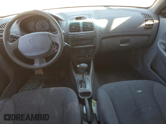 2002 Hyundai Accent GL with VIN KMHCG45C32U332833, listed as a Copart auction lot 66539644 with 69,763 mi miles and Salvage Title. Bid and sale history available at carsss.com. Image 8.
