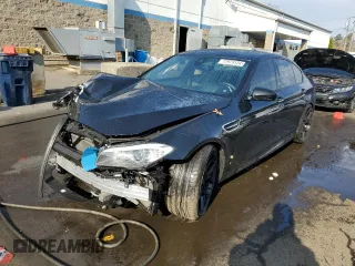 2013 BMW M5 with VIN WBSFV9C54DC772750, listed as a Copart auction lot 77979124 with 0 mi miles and Salvage Title. Bid and sale history available at carsss.com. Image 1.