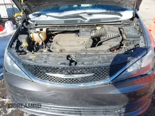 2017 Chrysler Pacifica Touring with VIN 2C4RC1DG7HR648786, listed as a IAAI auction lot 41570029 with 125,406 mi miles and . Bid and sale history available at DreamBid. Image 10.