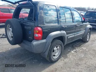 2002 Jeep Liberty Sport with VIN 1J4GL48K82W345855, listed as a IAAI auction lot 41687317 with 231,969 mi miles. Bid and sale history available at carsss.com. Image 4.
