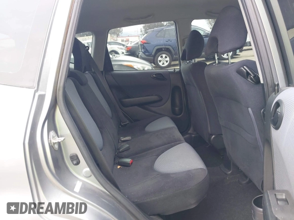 2007 Honda Fit with VIN JHMGD37467S065669, listed as a IAAI auction lot 42078795 with 124,030 mi miles. Bid and sale history available at carsss.com. Image 8.