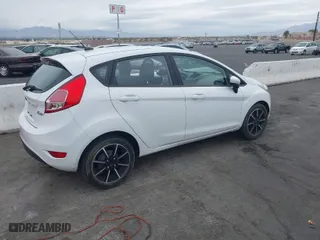 2019 Ford Fiesta SE with VIN 3FADP4EJ7KM121779, listed as a IAAI auction lot 41734728 with 90,590 mi miles. Bid and sale history available at carsss.com. Image 4.
