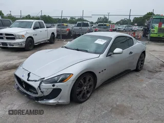 2013 Maserati GranTurismo Sport with VIN ZAM45VLA8D0072490, listed as a IAAI auction lot 42438872 with 84,214 mi miles and . Bid and sale history available at DreamBid. Image 2.