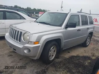 2009 Jeep Patriot Sport z VIN 1J4FT28A29D126757, wystawiony jako IAAI lot #42353541 z przebiegiem 122 277 mil mil oraz . Historia ofert i sprzedaży dostępna na DreamBid. Obrazek 2.
