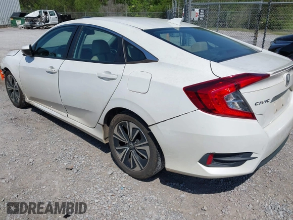 2018 Honda Civic EX-L with VIN 19XFC1F72JE002269, listed as a IAAI auction lot 41973885 with 130,979 mi miles and . Bid and sale history available at DreamBid. Image 3.