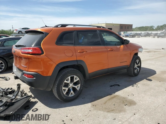 2015 Jeep Cherokee Trailhawk with VIN 1C4PJMBS5FW523019, listed as a Copart auction lot 55527955 with 107,503 mi miles and Salvage title. Bid and sale history available at DreamBid. Image 3.