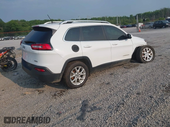 2018 Jeep Cherokee Latitude with VIN 1C4PJLCB3JD552189, listed as a IAAI auction lot 42350120 with 135,627 mi miles and . Bid and sale history available at DreamBid. Image 4.
