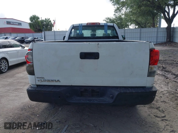 2010 Toyota Tundra with VIN 5TFLU5F10AX022832, listed as a IAAI auction lot 42504366 with 223,392 mi miles and . Bid and sale history available at DreamBid. Image 16.