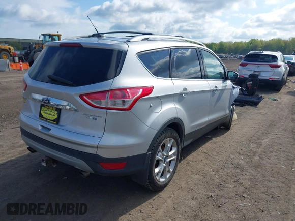 2015 Ford Escape Titanium z VIN 1FMCU9J99FUC75852, wystawiony jako IAAI lot #42171467 z przebiegiem 113 322 mil mil oraz . Historia ofert i sprzedaży dostępna na DreamBid. Obrazek 4.