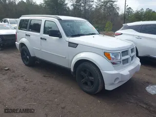 2010 Dodge Nitro SXT with VIN 1D4PU5GK7AW138708, listed as a IAAI auction lot 41440363 with 244,810 mi miles. Bid and sale history available at carsss.com. Image 1.