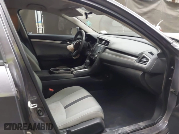 2020 Honda Civic LX with VIN 19XFC2F67LE006057, listed as a IAAI auction lot 42032759 with 119,319 mi miles and . Bid and sale history available at DreamBid. Image 5.
