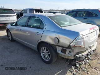 2012 Ford Fusion S with VIN 3FAHP0GA2CR143572, listed as a IAAI auction lot 41826526 with 199,083 mi miles. Bid and sale history available at carsss.com. Image 3.