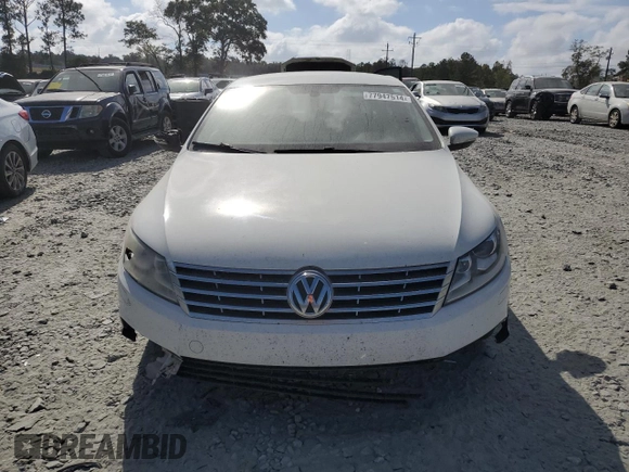2013 Volkswagen CC Sport with VIN WVWBP7ANXDE565694, listed as a Copart auction lot 77947514 with 180,160 mi miles and Salvage Title. Bid and sale history available at carsss.com. Image 5.