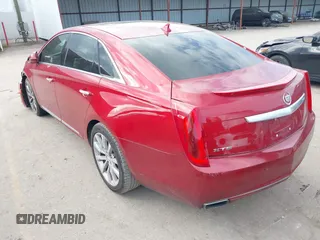 2013 Cadillac XTS Luxury with VIN 2G61P5S32D9143521, listed as a IAAI auction lot 41167887 with 193,347 mi miles and . Bid and sale history available at carsss.com. Image 3.