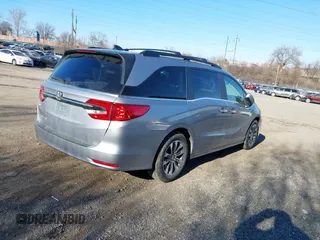 2023 Honda Odyssey EX-L with VIN 5FNRL6H68PB070545, listed as a IAAI auction lot 41331357 with 13,448 mi miles. Bid and sale history available at carsss.com. Image 4.