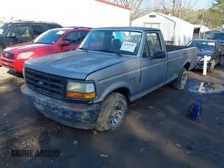 1995 Ford F-150 with VIN 1FTDF15YXSNA29547, listed as a IAAI auction lot 41569707 with 185,000 mi miles. Bid and sale history available at carsss.com. Image 2.
