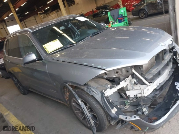 2018 BMW X5 xDrive40e iPerformance with VIN 5UXKT0C59J0V98760, listed as a IAAI auction lot 40983738 with 126,278 mi miles. Bid and sale history available at carsss.com. Image 13.