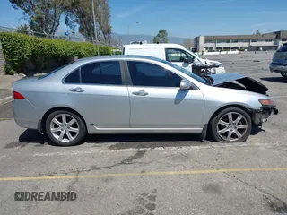 2004 Acura TSX w/Navigation z VIN JH4CL96934C023631, wystawiony jako IAAI lot #41993059 z przebiegiem 165 449 mil mil oraz . Historia ofert i sprzedaży dostępna na DreamBid. Obrazek 13.