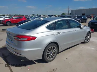 2019 Ford Fusion SEL with VIN 3FA6P0CD2KR116863, listed as a IAAI auction lot 42011256 with 72,676 mi miles. Bid and sale history available at carsss.com. Image 4.