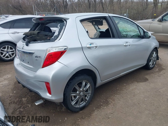 2012 Toyota Yaris L with VIN JTDKTUD35CD518484, listed as a IAAI auction lot 41863849 with 106,024 mi miles. Bid and sale history available at carsss.com. Image 4.