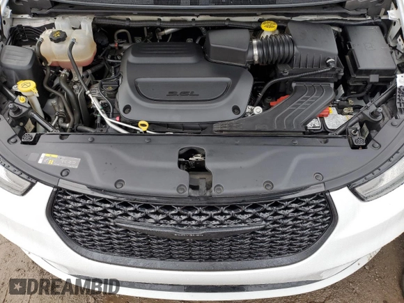 2021 Chrysler Pacifica Touring L with VIN 2C4RC3BG3MR525690, listed as a Copart auction lot 83658704 with 51,389 mi miles and Salvage title. Bid and sale history available at DreamBid. Image 13.