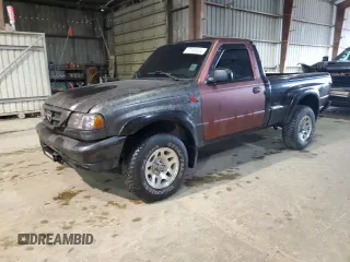 2001 Mazda B-Series Truck DS z VIN 4F4YR12U01TM28382, wystawiony jako Copart lot #77695604 z przebiegiem 165 103 mil mil oraz Szkoda całkowita • Salvage title. Historia ofert i sprzedaży dostępna na DreamBid. Obrazek 1.