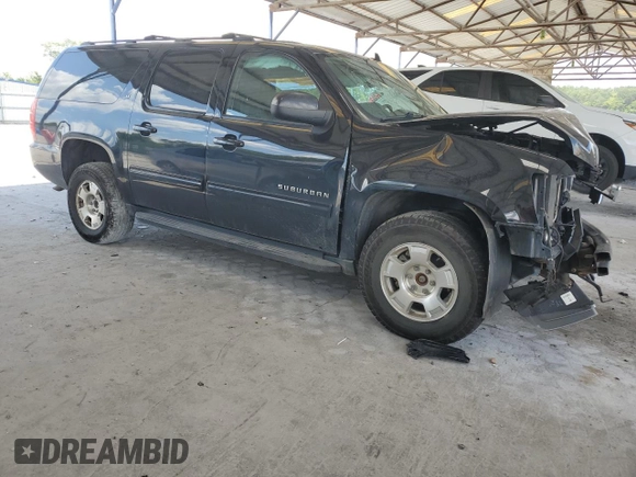 2012 Chevrolet Suburban LT with VIN 1GNSKJE77CR224789, listed as a Copart auction lot 63944485 with 228,477 mi miles and Salvage title. Bid and sale history available at DreamBid. Image 4.