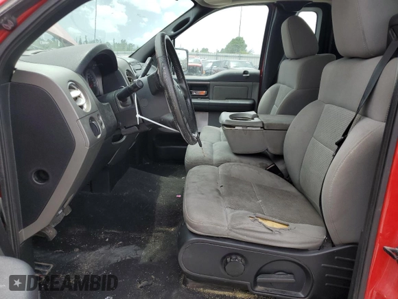 2004 Ford F-150 XL with VIN 1FTRF14524NC39799, listed as a Copart auction lot 59115774 with 156,709 mi miles and Salvage Title. Bid and sale history available at DreamBid. Image 7.