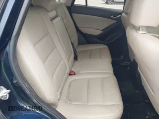 2014 Mazda CX-5 Grand Touring with VIN JM3KE2DY8E0425258, listed as a IAAI auction lot 42179452 with 132,137 mi miles. Bid and sale history available at carsss.com. Image 8.