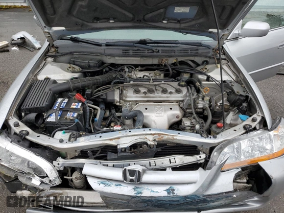 2002 Honda Accord LX z VIN 3HGCG56412G708628, wystawiony jako Copart lot #57347935 z przebiegiem 146 894 mil mil oraz Szkoda całkowita • Salvage title. Historia ofert i sprzedaży dostępna na DreamBid. Obrazek 11.