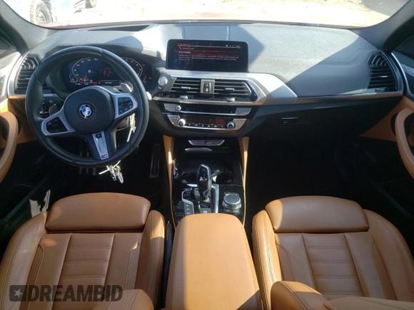 2021 BMW X4 M40i with VIN 5UX2V5C0XM9E78318, listed as a Copart auction lot 57834645 with 67,277 mi miles and Salvage title. Bid and sale history available at DreamBid. Image 8.