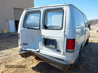 1999 Ford Econoline Cargo with VIN 1FTRE14W0XHB64440, listed as a IAAI auction lot 41645551 with 239,114 mi miles. Bid and sale history available at carsss.com. Image 16.