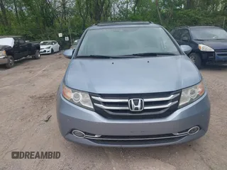 2014 Honda Odyssey Touring with VIN 5FNRL5H91EB081811, listed as a IAAI auction lot 42153920 with 16 mi miles and . Bid and sale history available at DreamBid. Image 12.