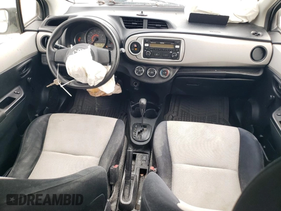 2012 Toyota Yaris L with VIN JTDKTUD30CD528470, listed as a Copart auction lot 79952414 with 157,062 mi miles and Salvage Title. Bid and sale history available at DreamBid. Image 8.