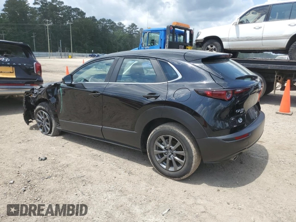 2023 Mazda CX-30 S with VIN 3MVDMBAM6PM513651, listed as a Copart auction lot 57432955 with 49,851 mi miles and Salvage title. Bid and sale history available at DreamBid. Image 2.