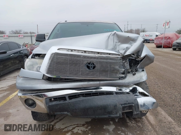 2012 Toyota Tundra z VIN 5TFRY5F18CX121917, wystawiony jako IAAI lot #41475681 z przebiegiem 166 507 mil mil oraz . Historia ofert i sprzedaży dostępna na DreamBid. Obrazek 12.