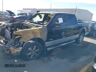 2011 Ford F-150 XLT with VIN 1FTFW1ETXBFC42036, listed as a IAAI auction lot 41643109 with 1 mi miles. Bid and sale history available at carsss.com. Image 2.