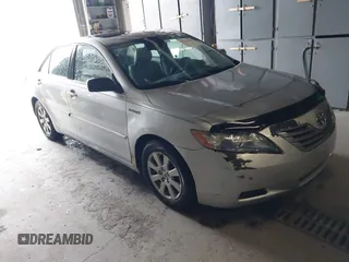 2007 Toyota Camry z VIN JTNBB46K973038138, wystawiony jako IAAI lot #42233680 z przebiegiem 230 480 mil mil oraz . Historia ofert i sprzedaży dostępna na DreamBid. Obrazek 1.