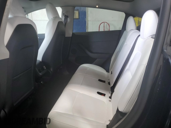 2022 Tesla Model Y Performance z VIN 7SAYGDEF7NF523532, wystawiony jako Copart lot #59949915 z przebiegiem 50 428 mil mil oraz Szkoda całkowita • Salvage title. Historia ofert i sprzedaży dostępna na DreamBid. Obrazek 11.