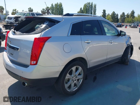 2011 Cadillac SRX Premium Collection with VIN 3GYFNFEYXBS599279, listed as a IAAI auction lot 42372367 with 97,888 mi miles and . Bid and sale history available at DreamBid. Image 4.