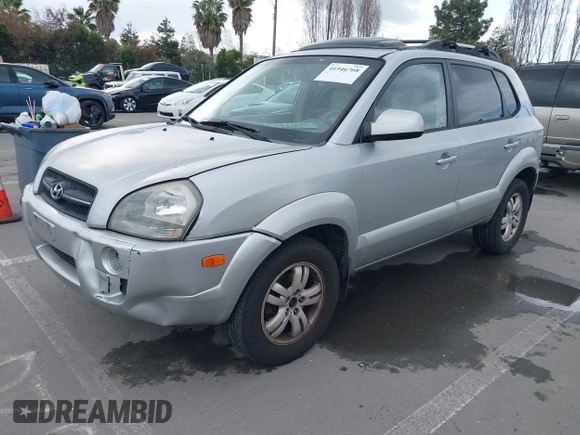 2007 Hyundai Tucson SE with VIN KM8JN12D07U670447, listed as a IAAI auction lot 41946768 with 209,079 mi miles. Bid and sale history available at carsss.com. Image 2.