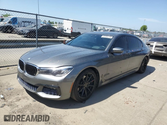 2017 BMW 7 Series 740i with VIN WBA7E2C55HG739108, listed as a Copart auction lot 53304715 with 114,510 mi miles and Salvage title. Bid and sale history available at DreamBid. Image 1.
